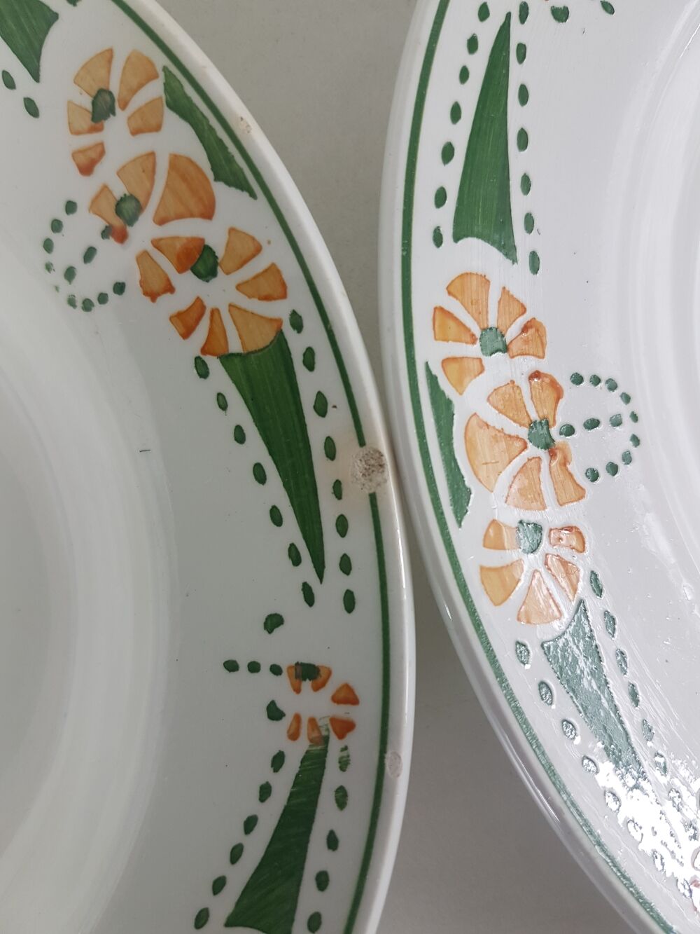 12 hollow plates made of Longwy earthenware