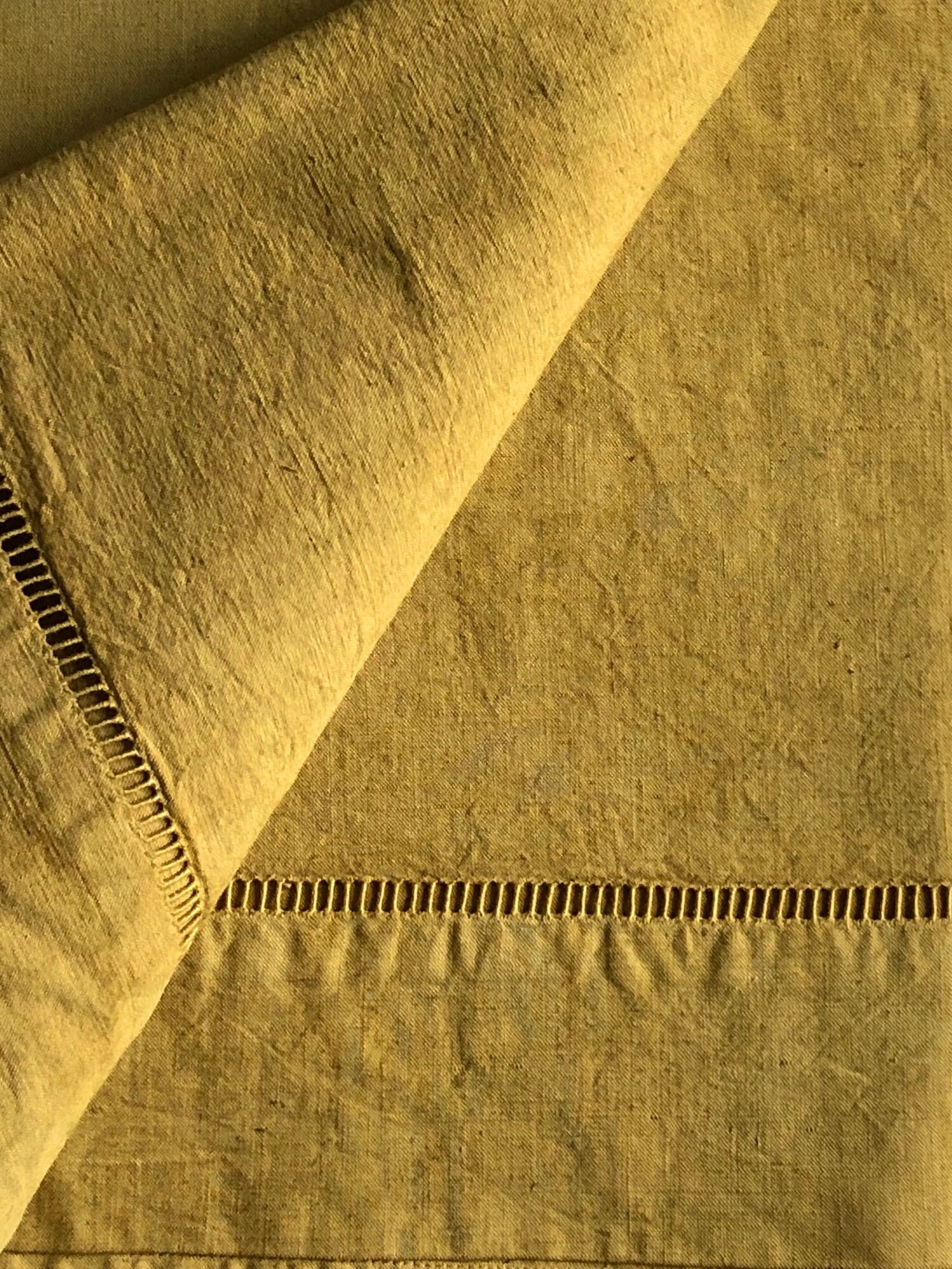 Old linen and cotton sheet embroidered and tinted in Indian yellow