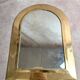 Vintage Moroccan wall mirror in brass, arch shape.