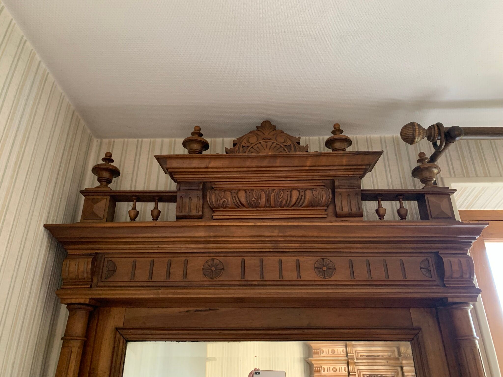 Mirror and low walnut cabinet