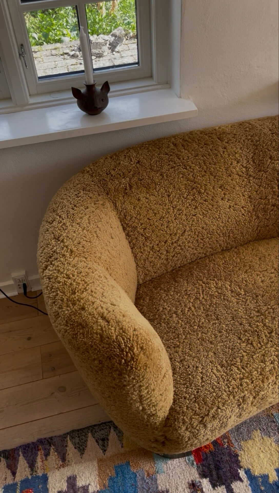 1950s banana sofa w/ lamb skin