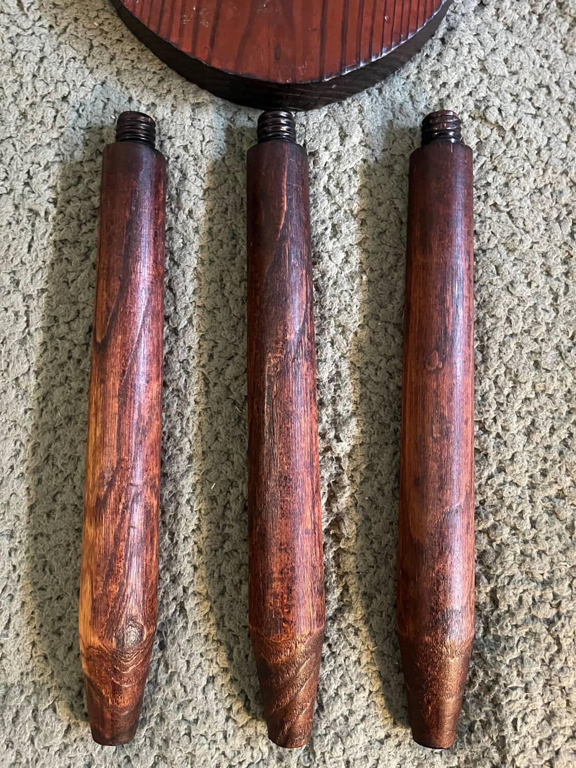 Round wooden tripod stool