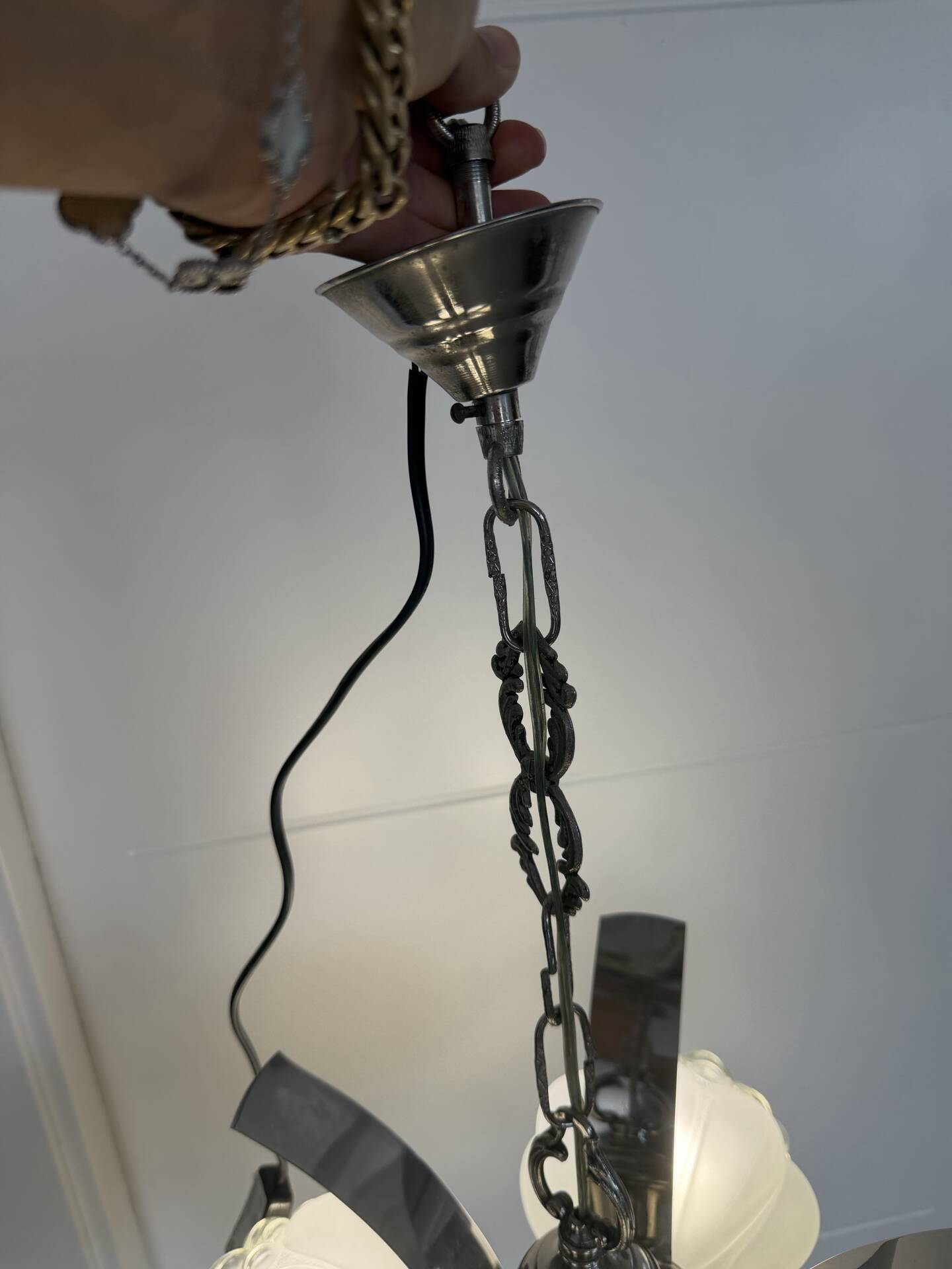 Vintage chandelier with 4 glass bubble globes and silvered metal.