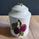 Porcelain jam pot with hand-painted plum design, signed sweet jar.