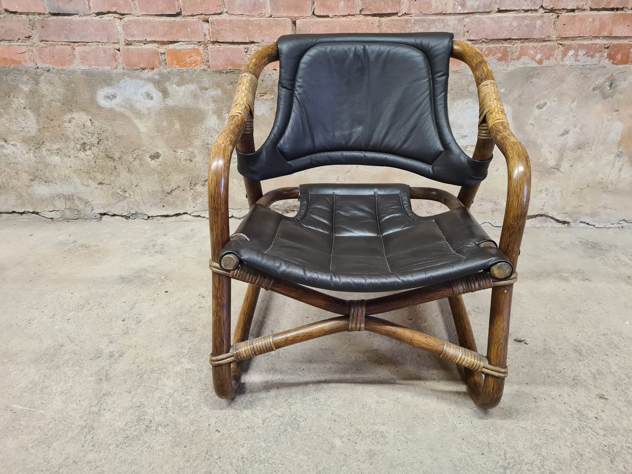Pair of vintage skaï bamboo armchairs
