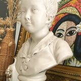 Cherub bust in platter