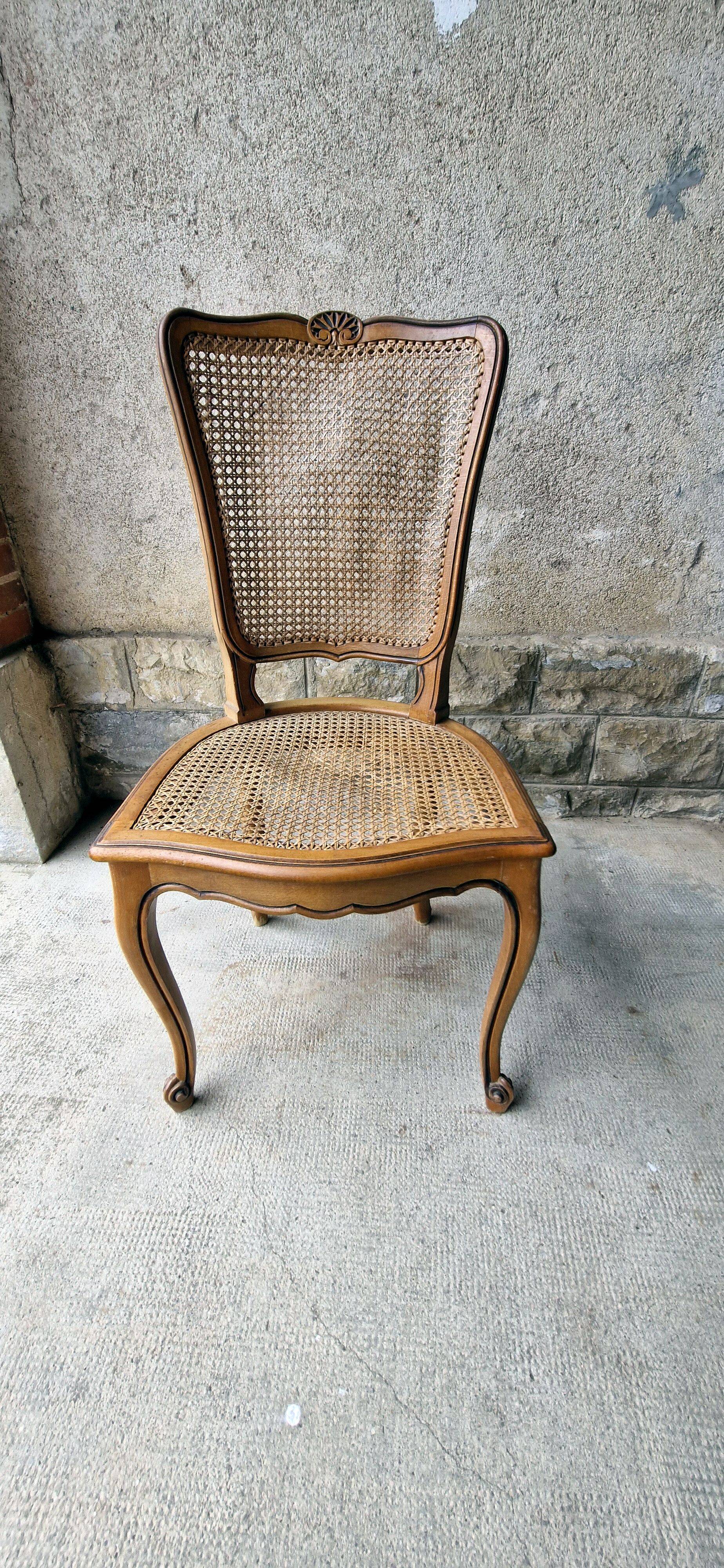 5 old cane-seated solid oak chairs.