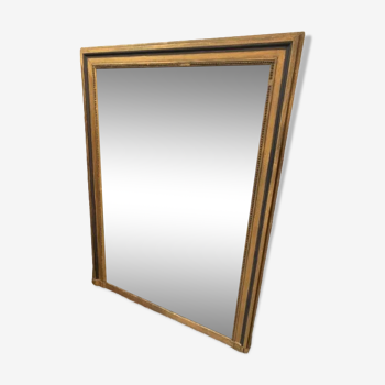 Giled and black fireplace mirror
