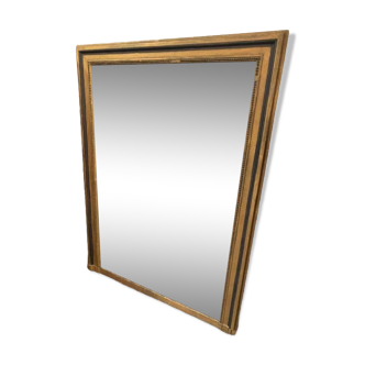 Giled and black fireplace mirror