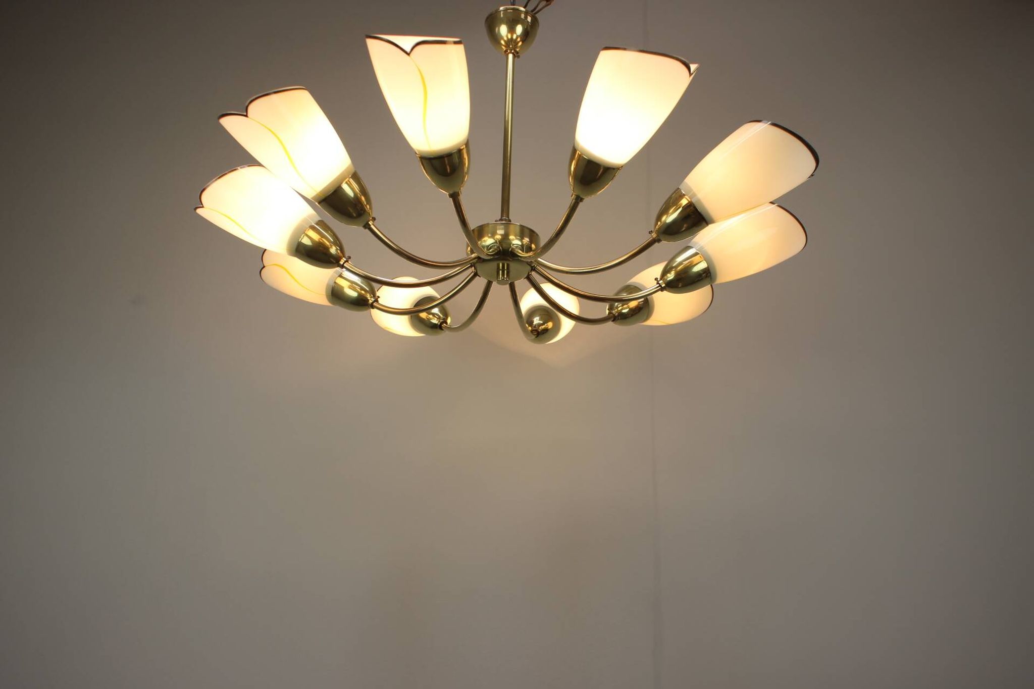Brass and glass ten-arm chandelier from the mid-century, 1960s.