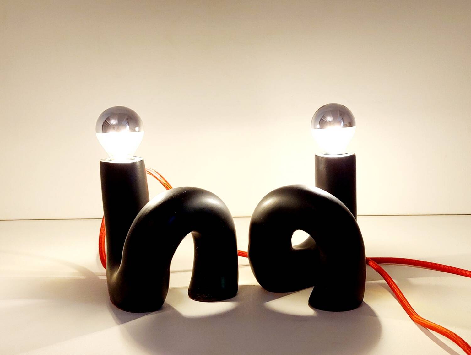 Pair of ceramic designer lamps