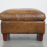Sheepskin wing chair + XXL patinated footrest