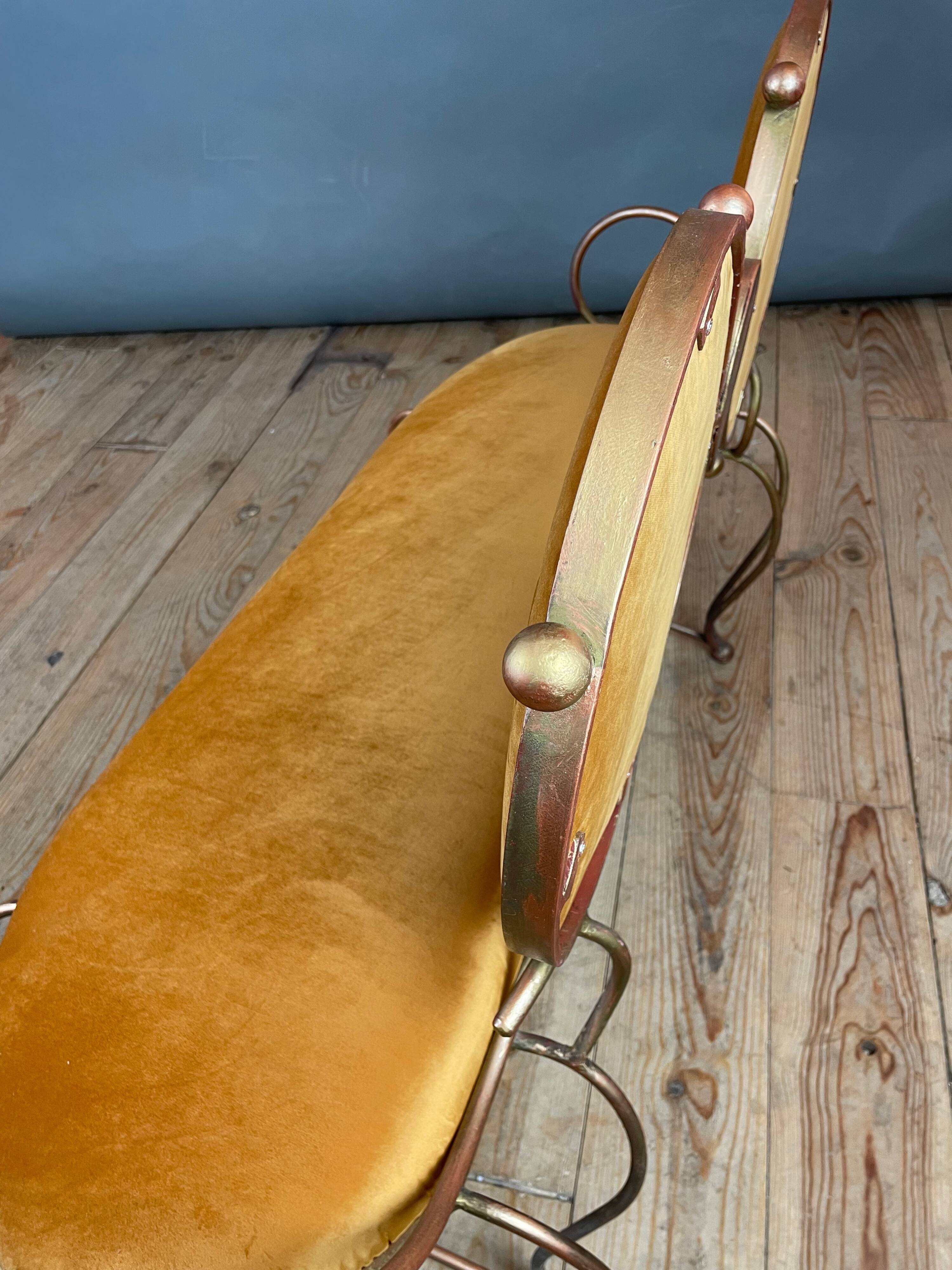 Wrought iron and velvet sofa