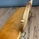 Wrought iron and velvet sofa