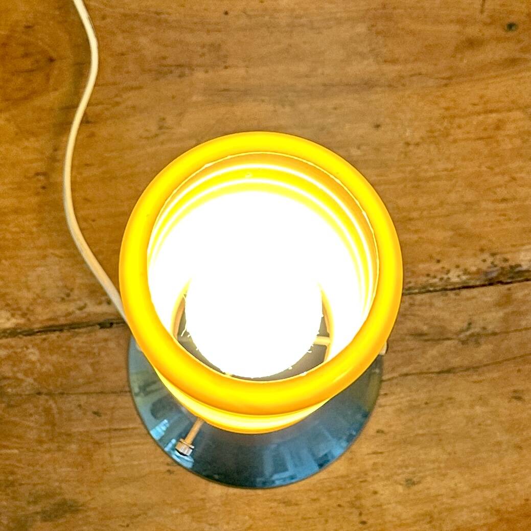 Vintage orange lamp with chrome tulip base and glass shade