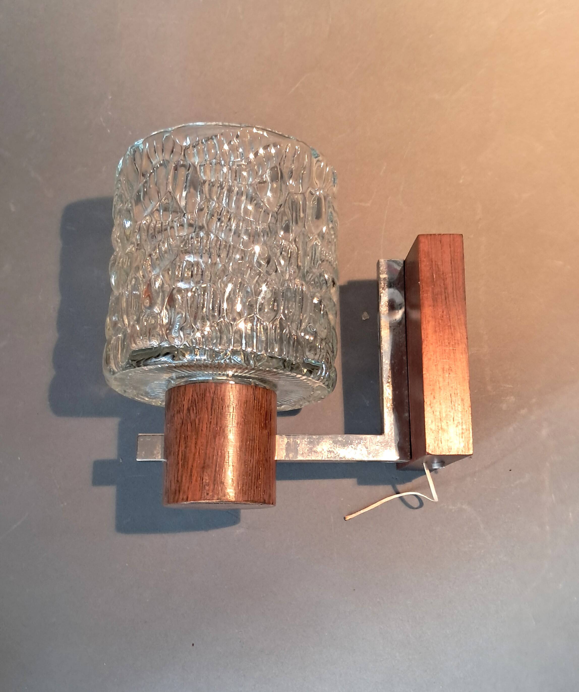 Scandinavian teak and chrome wall light from the 1960s.