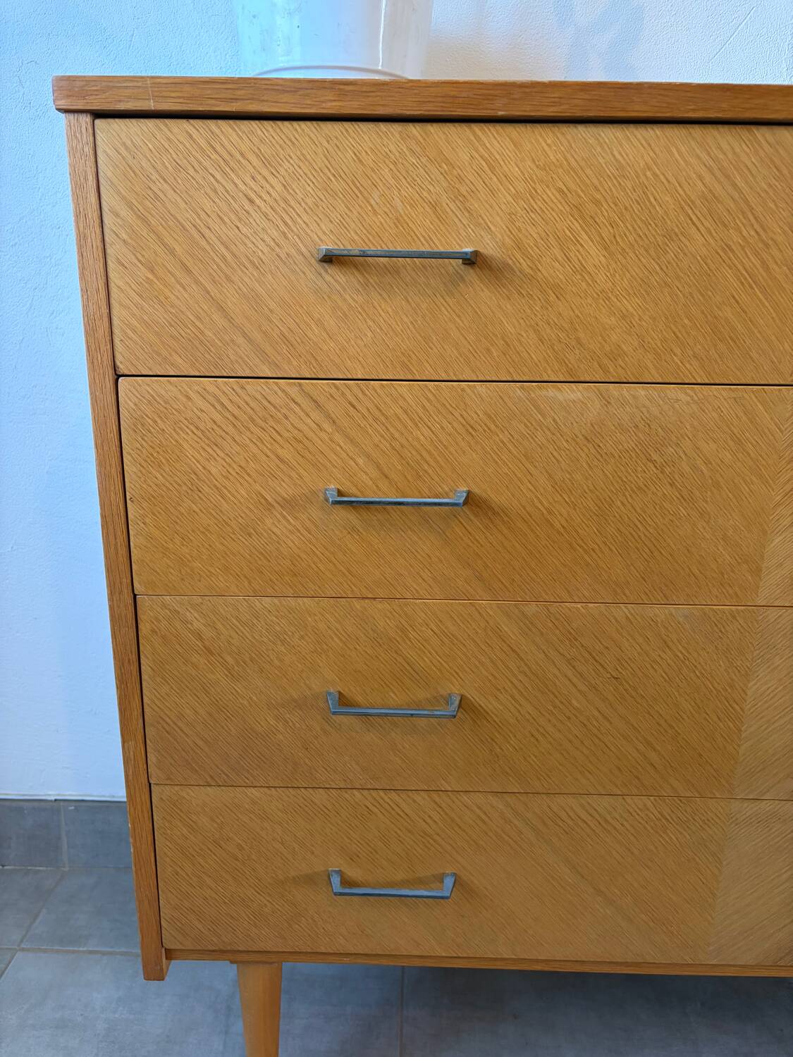 Vintage oak chest of drawers from the 1960s.