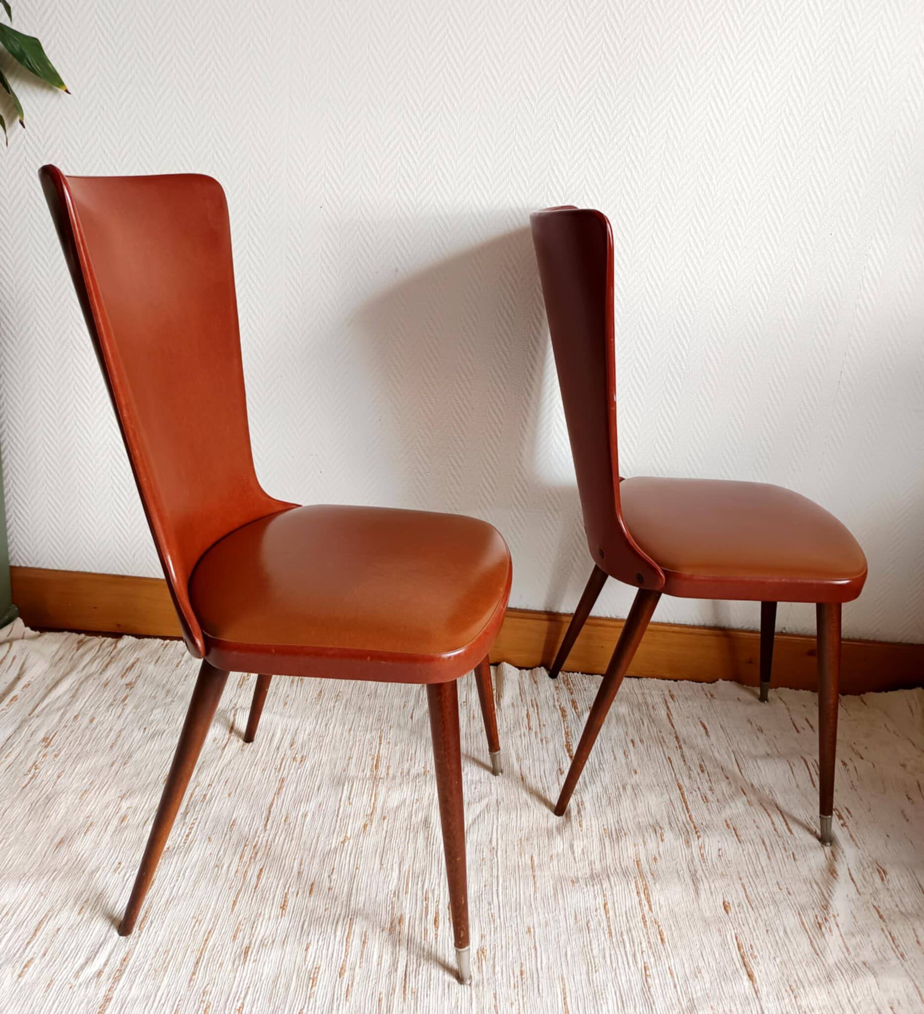 Pair of vintage vinyl chairs with splayed legs
