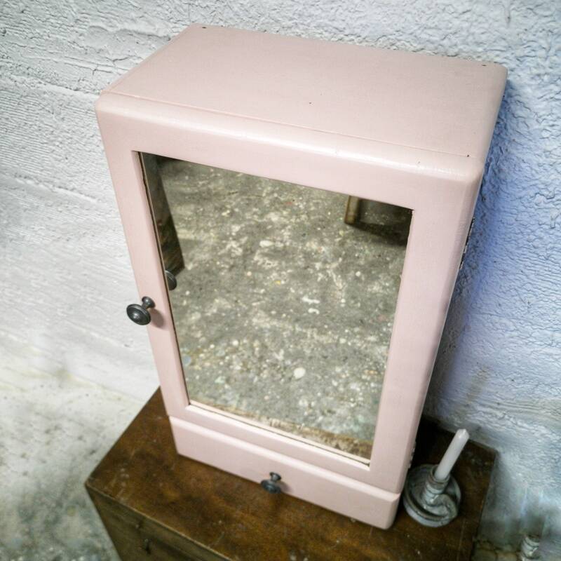 Pink bathroom cabinet