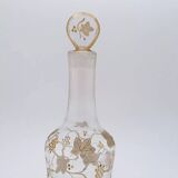 Old crystal carafe with golden decoration