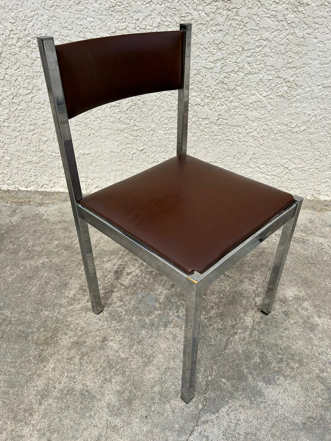 4 vintage leather/iron chairs