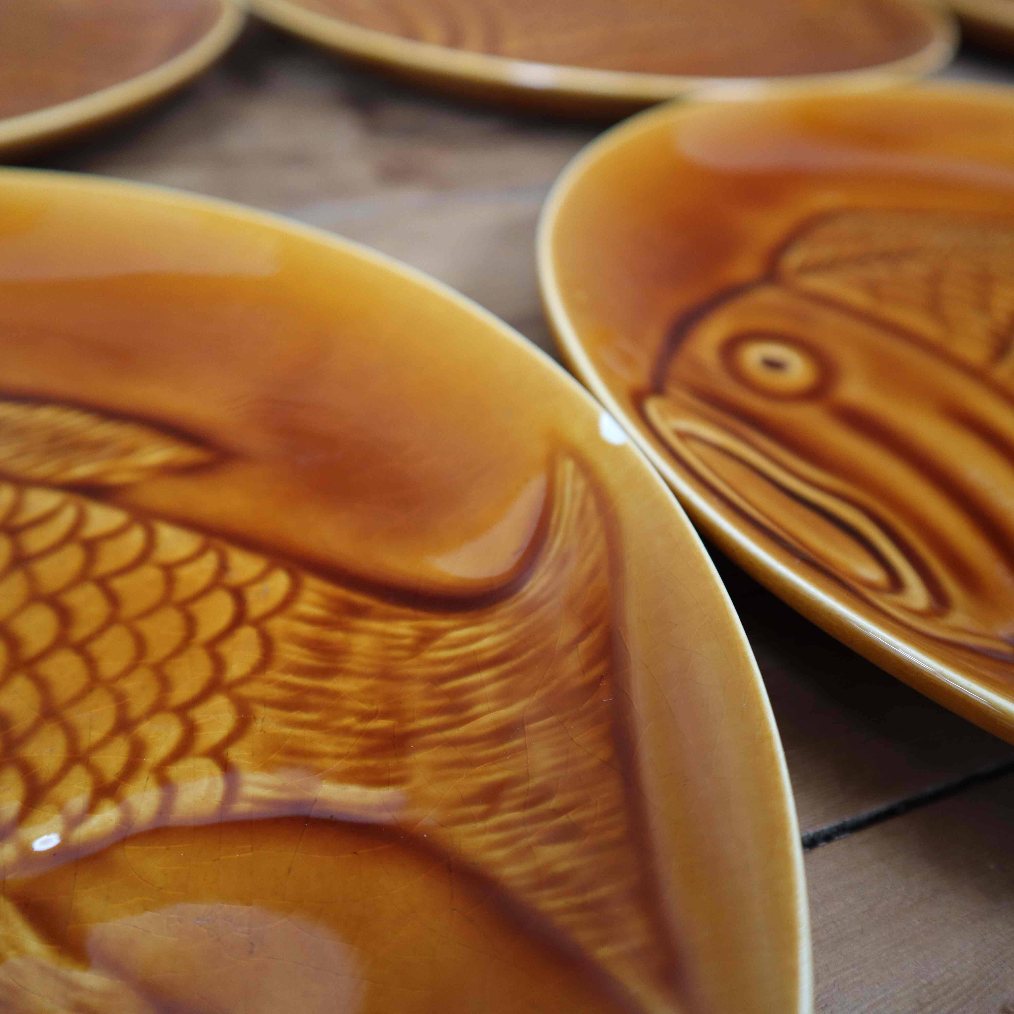 8 glazed flat plates with vintage fish decoration Saint Amand