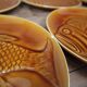 8 glazed flat plates with vintage fish decoration Saint Amand