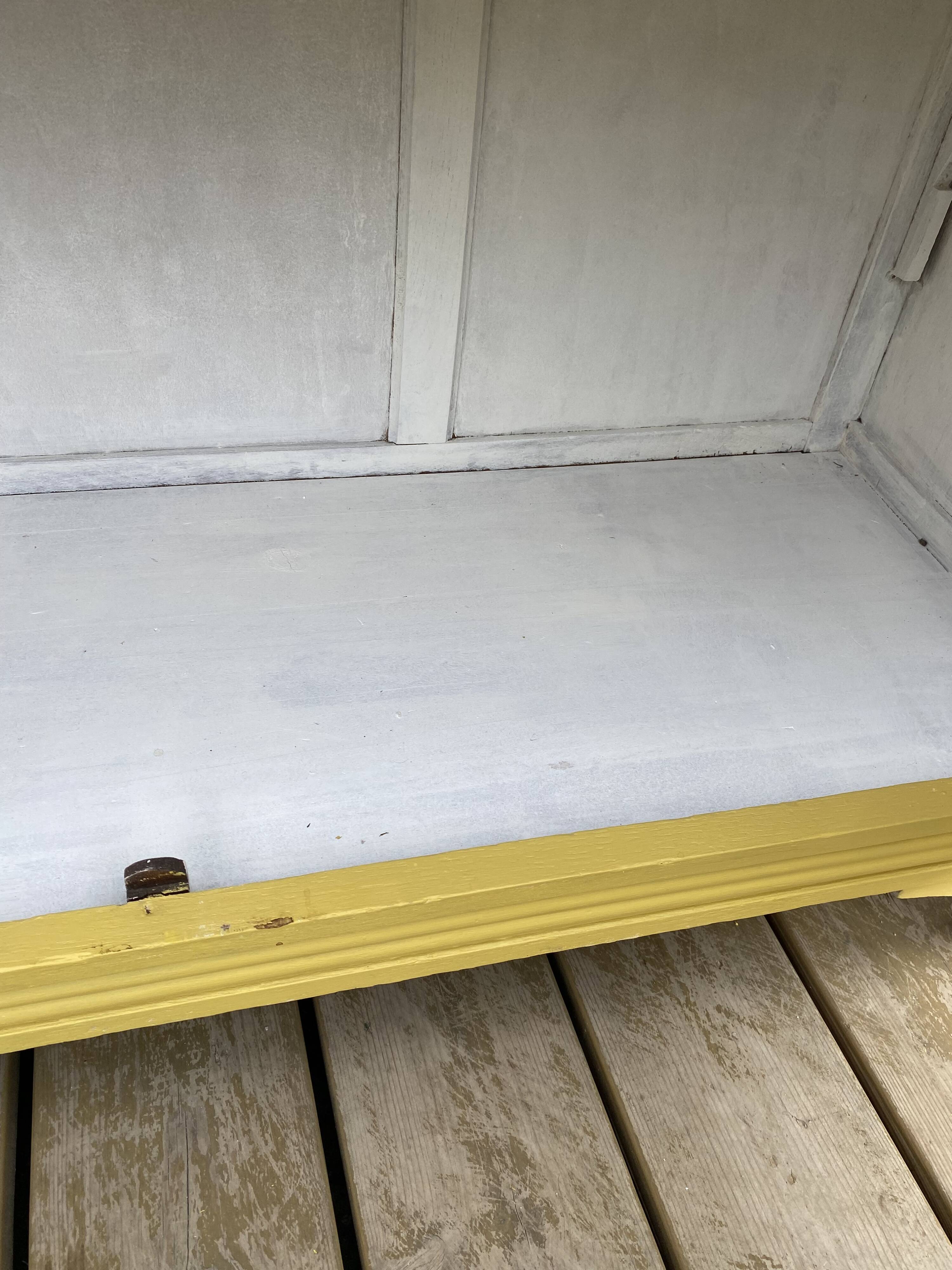 Antique yellow display cabinet
