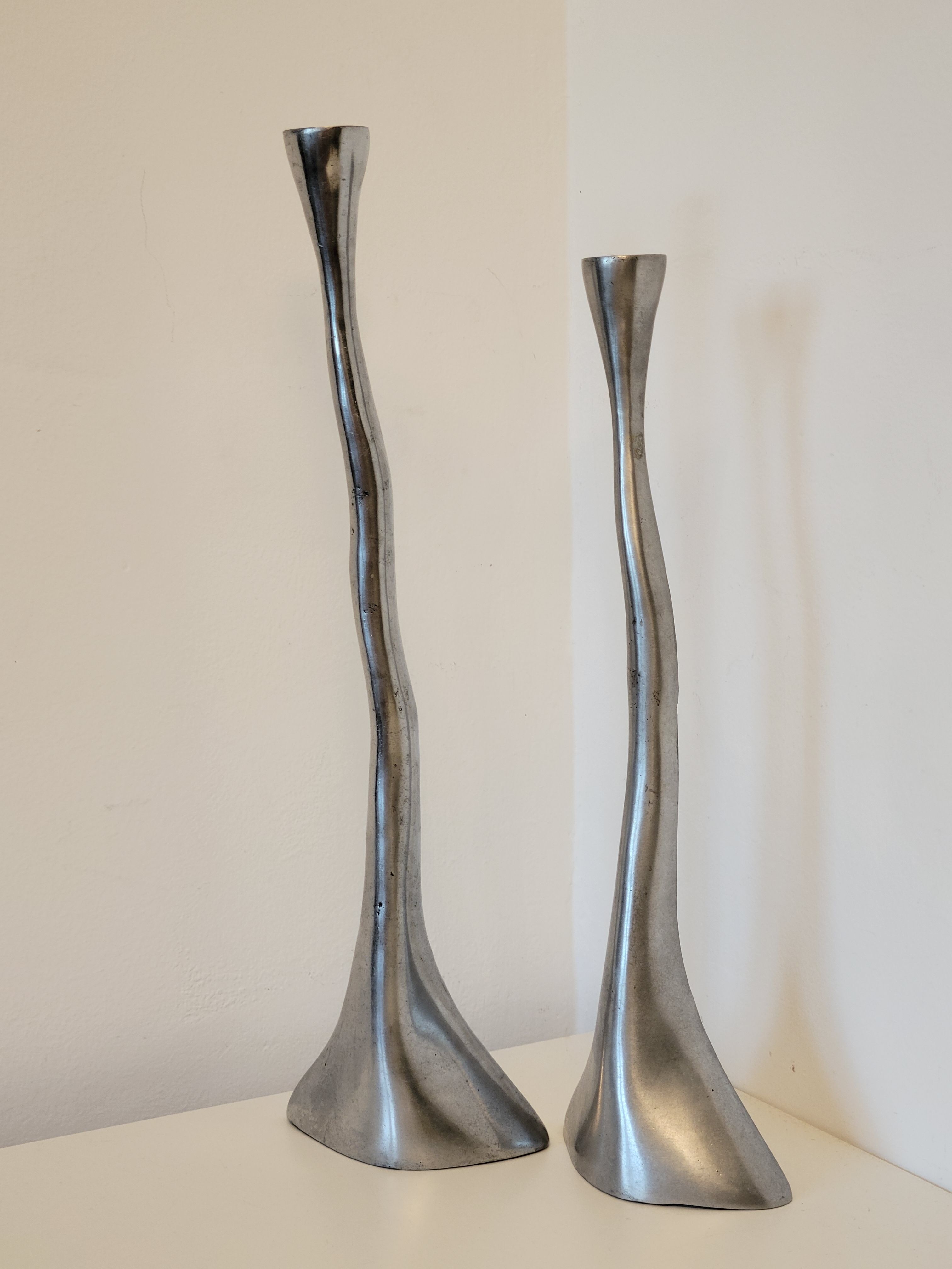 Pair of brutalist metal candlesticks in organic shape sleek design