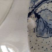 Two flat plates in earthenware with blue floral decoration.