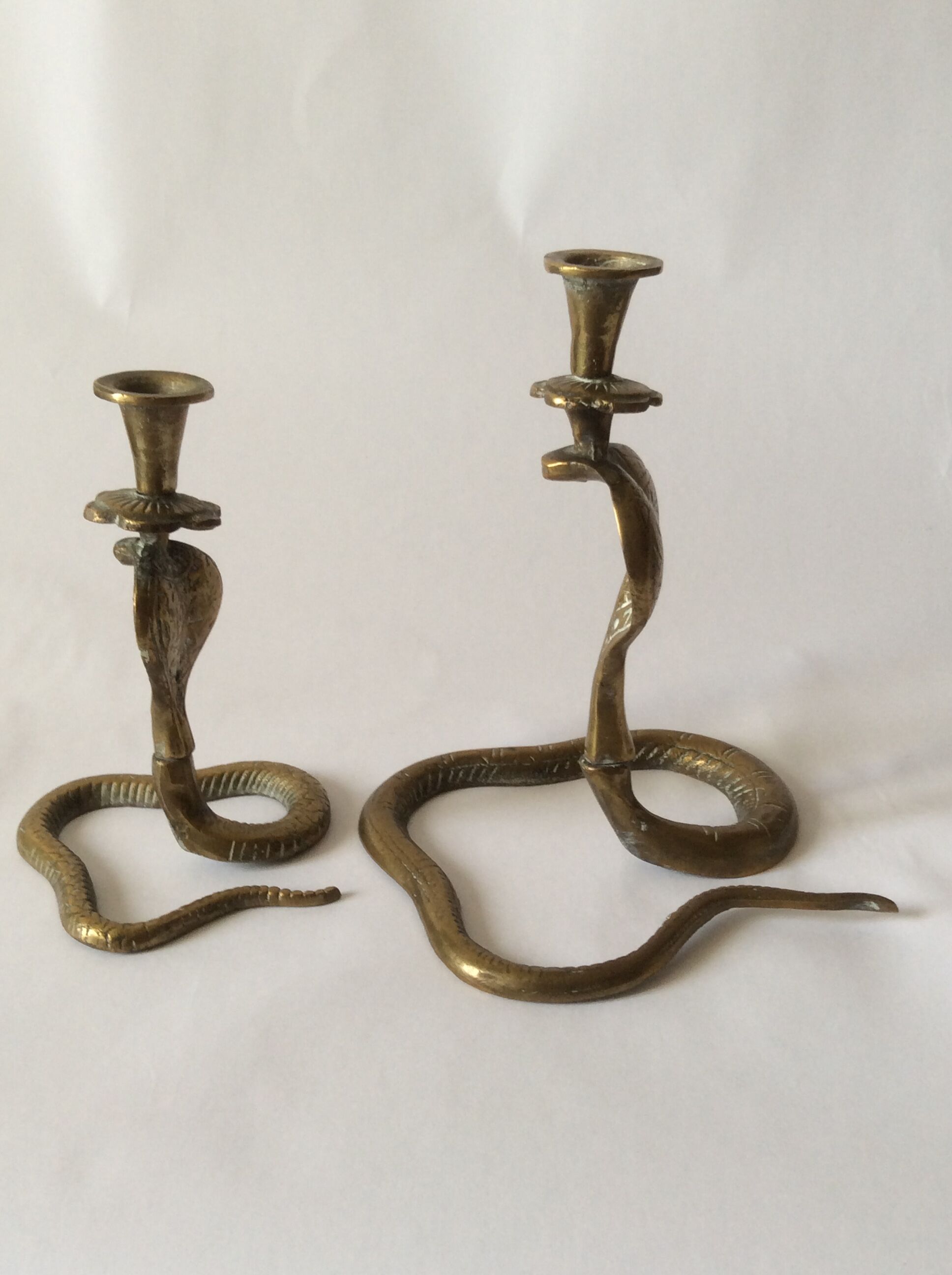 Two zoomorphic brass cobra snake candlesticks