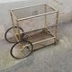 Vintage brass service 4 wheels