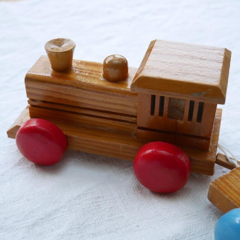 Wooden train with soldiers