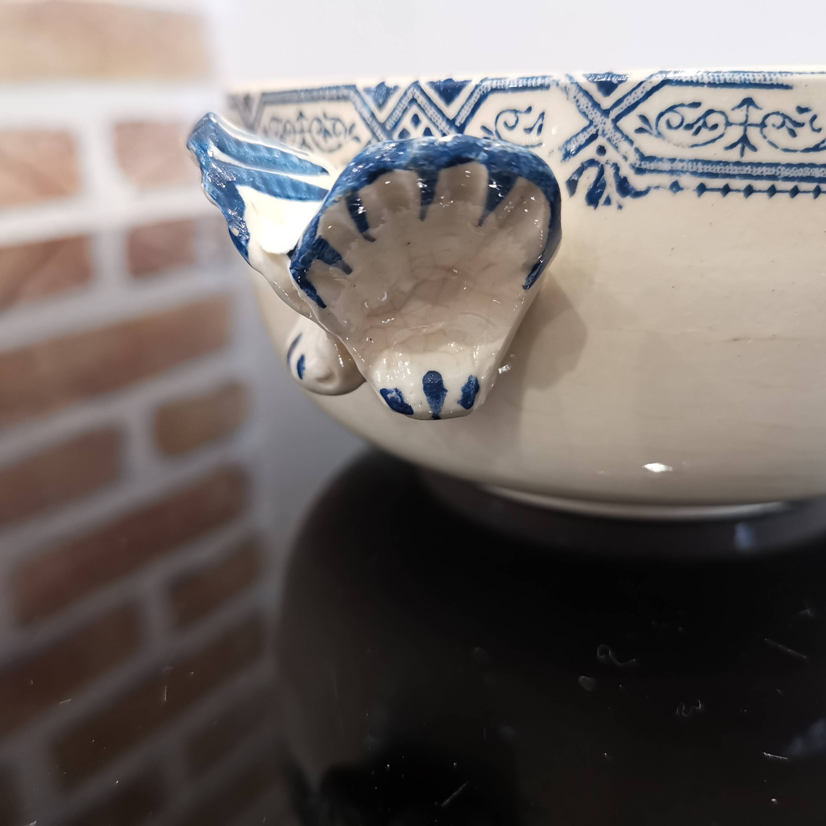Butterfly ear bowl in iron clay with blue patterns