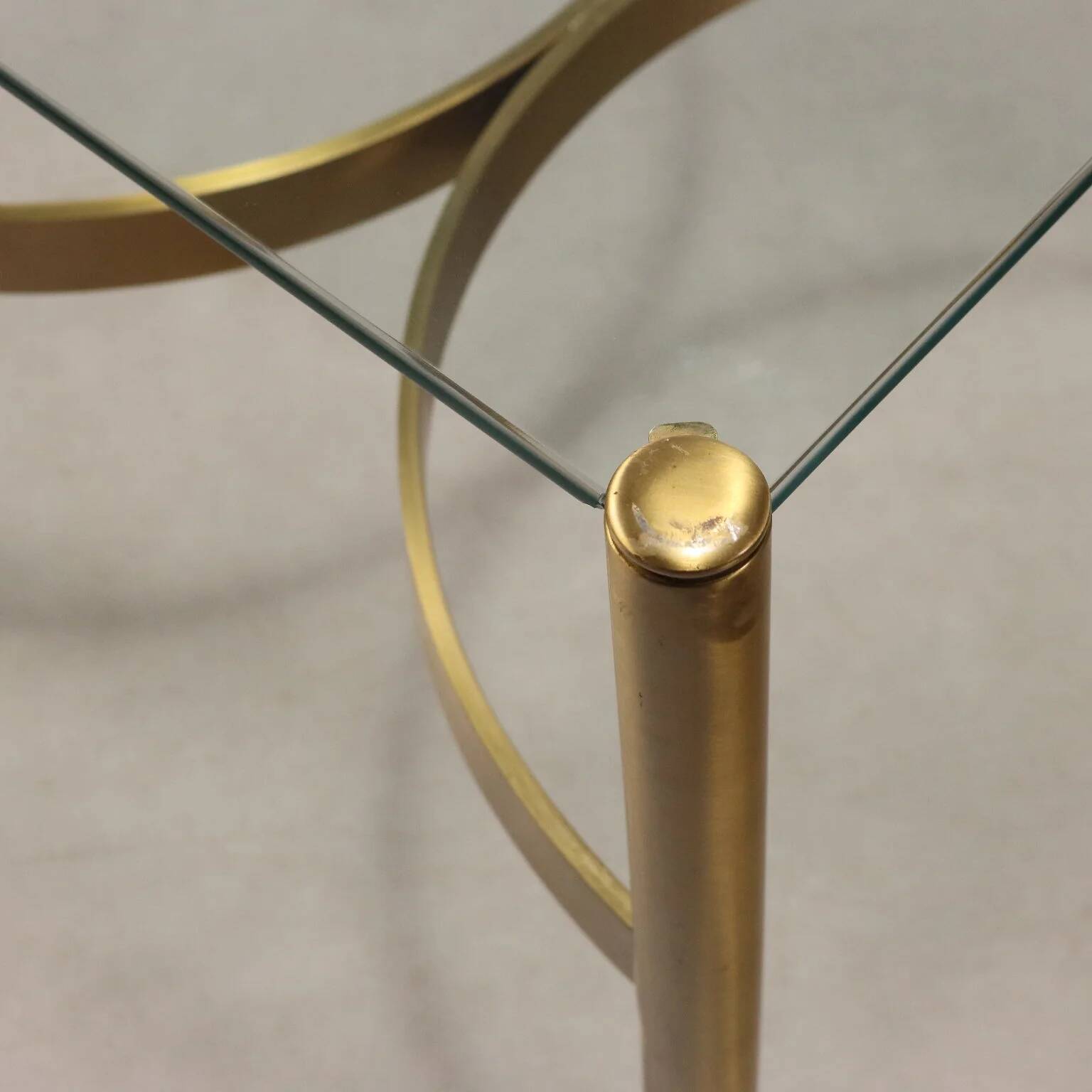 Vintage brass coffee table with glass top, Italian design from the 1970s.