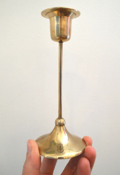 Trio of brass candlesticks