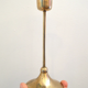 Trio of brass candlesticks