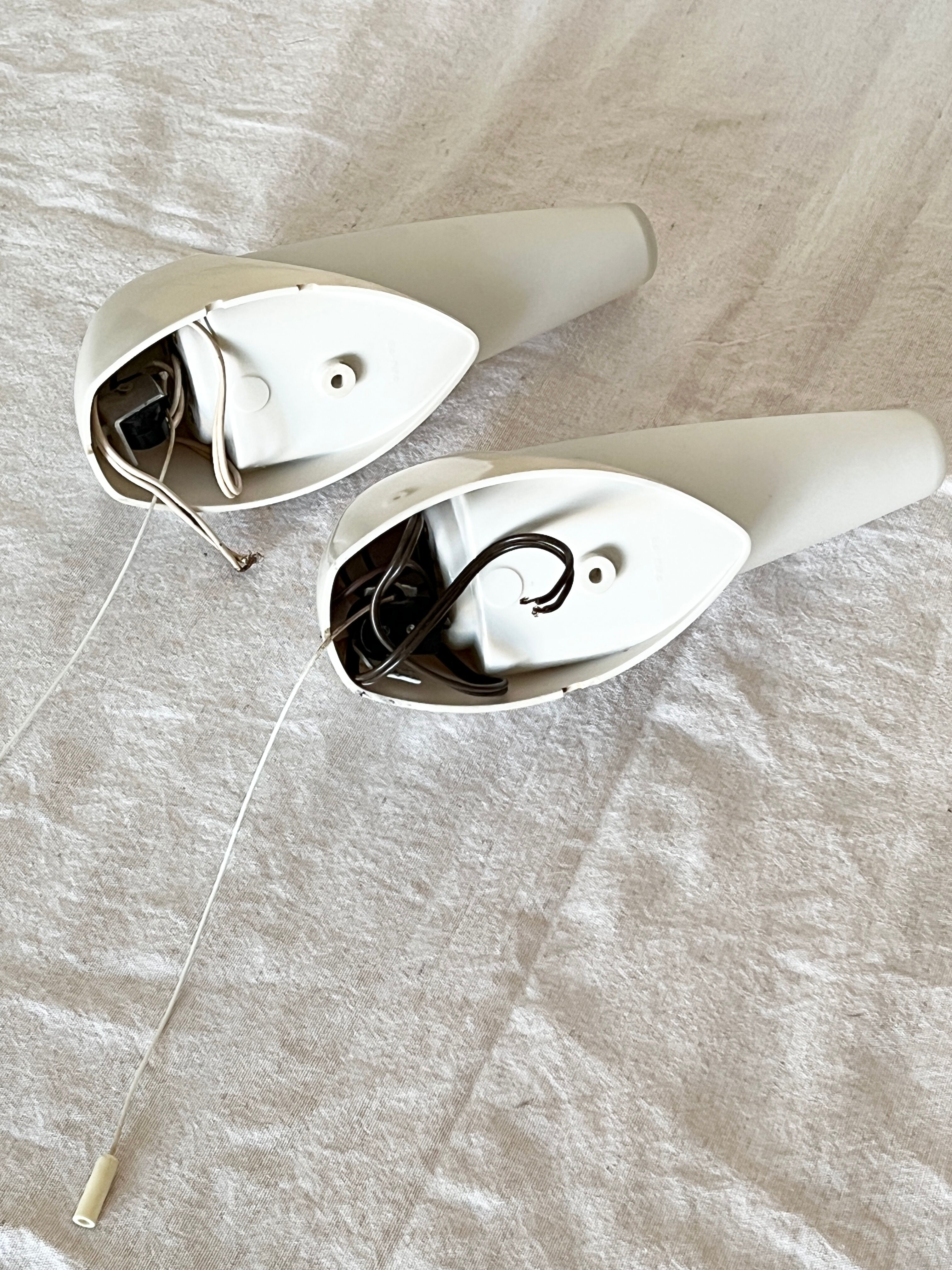 Set of two Small mid-century bakelite & glass wall lamps by Bo Niko Belgium, 1960s