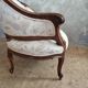 Small sofa or bench in Louis XV style, rococo.