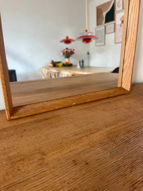 Vintage Danish oak mirror with bevelled edges.