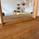 Vintage Danish oak mirror with bevelled edges.