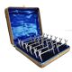 12 silver-plated metal knife handles, in a case.