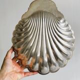 large silver-plated metal shell-shaped dish