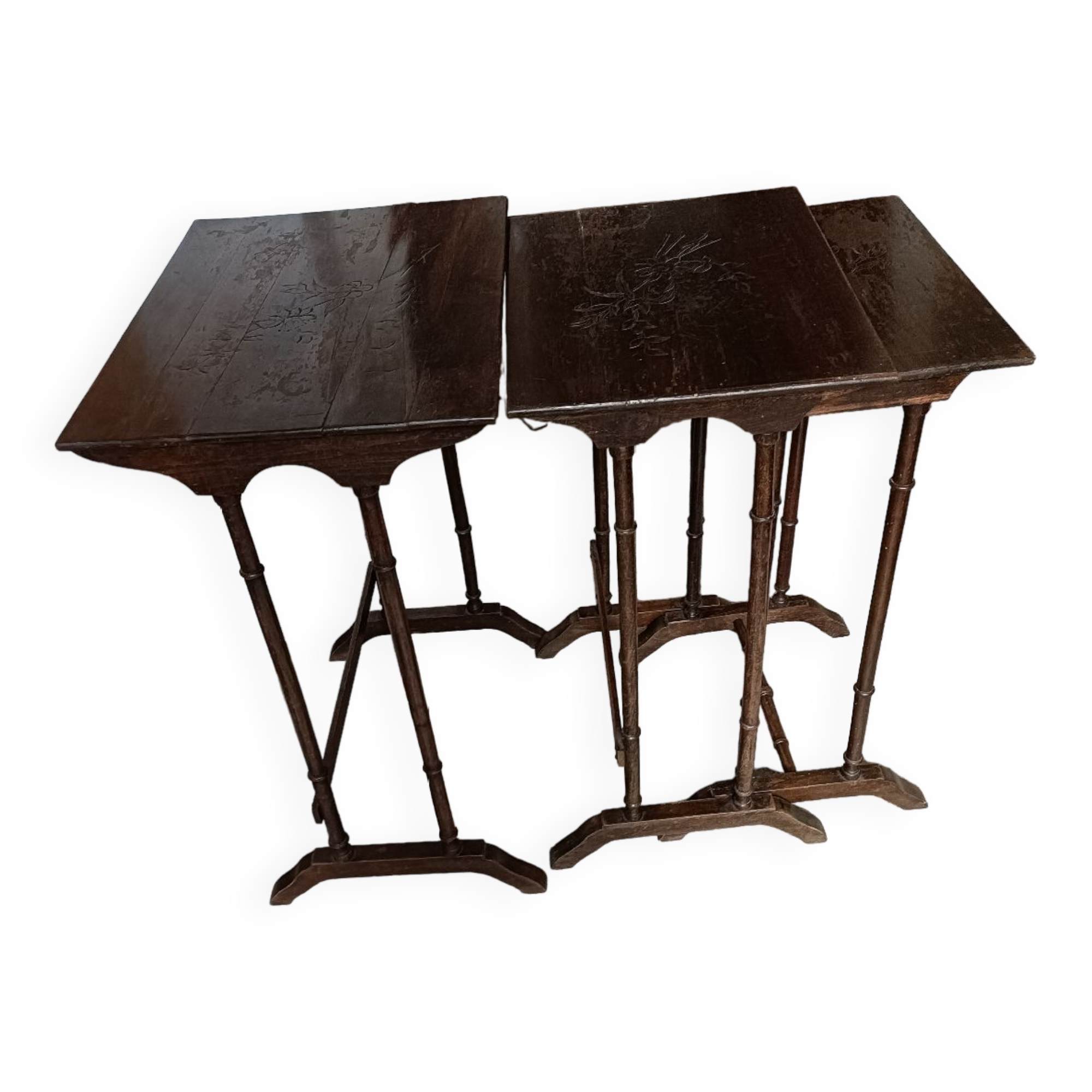 Stackable tables with pyrography.