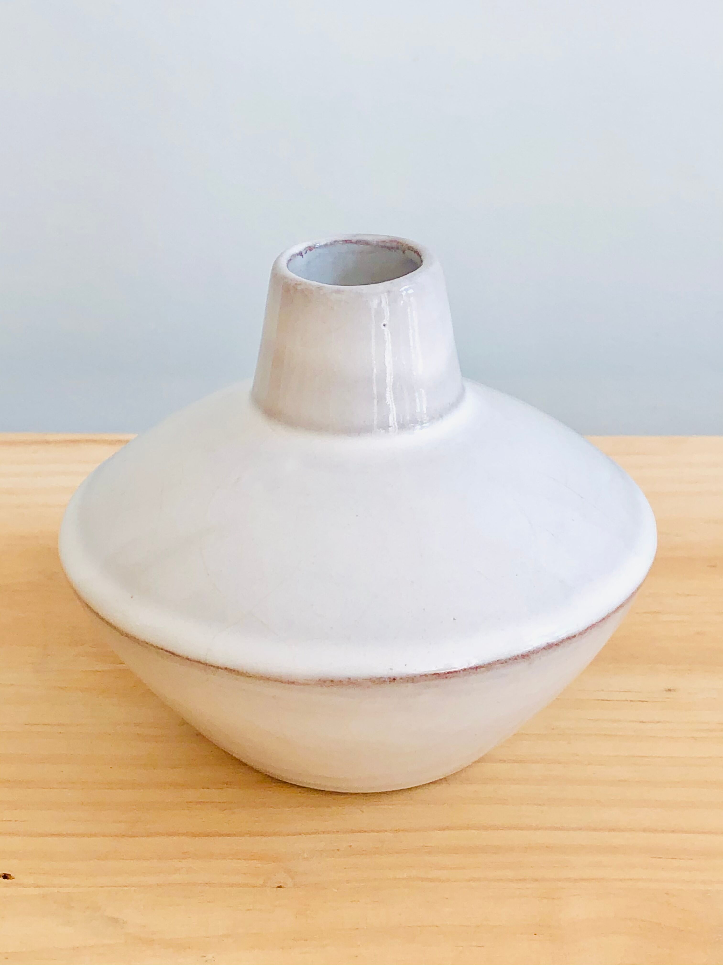 White enamelled terracotta vase