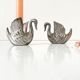 Duo candle holders in metal swan pattern
