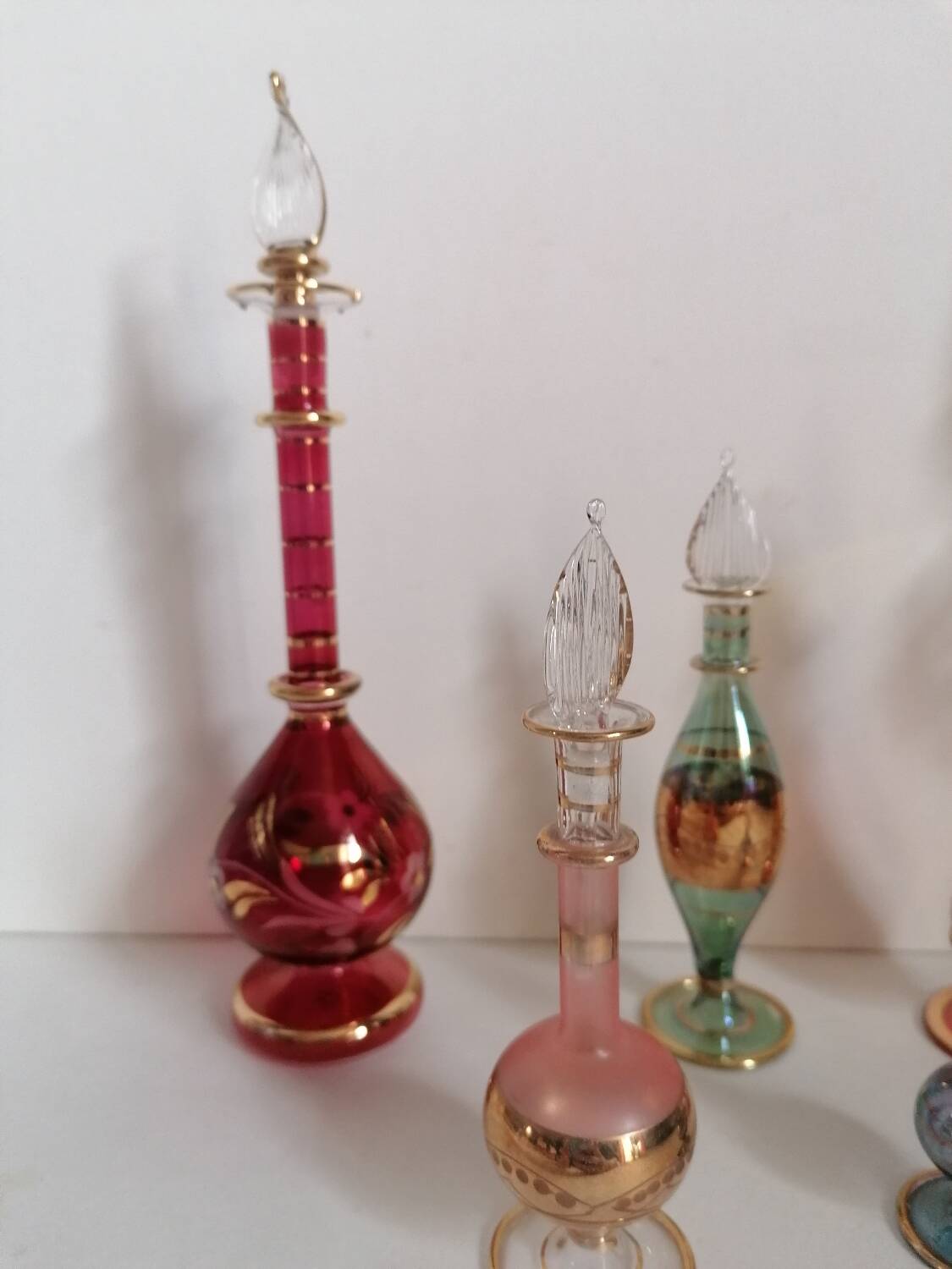 6 Egyptian gold and mouth-blown perfume bottles