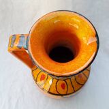 Orange ceramic pitcher from Italy
