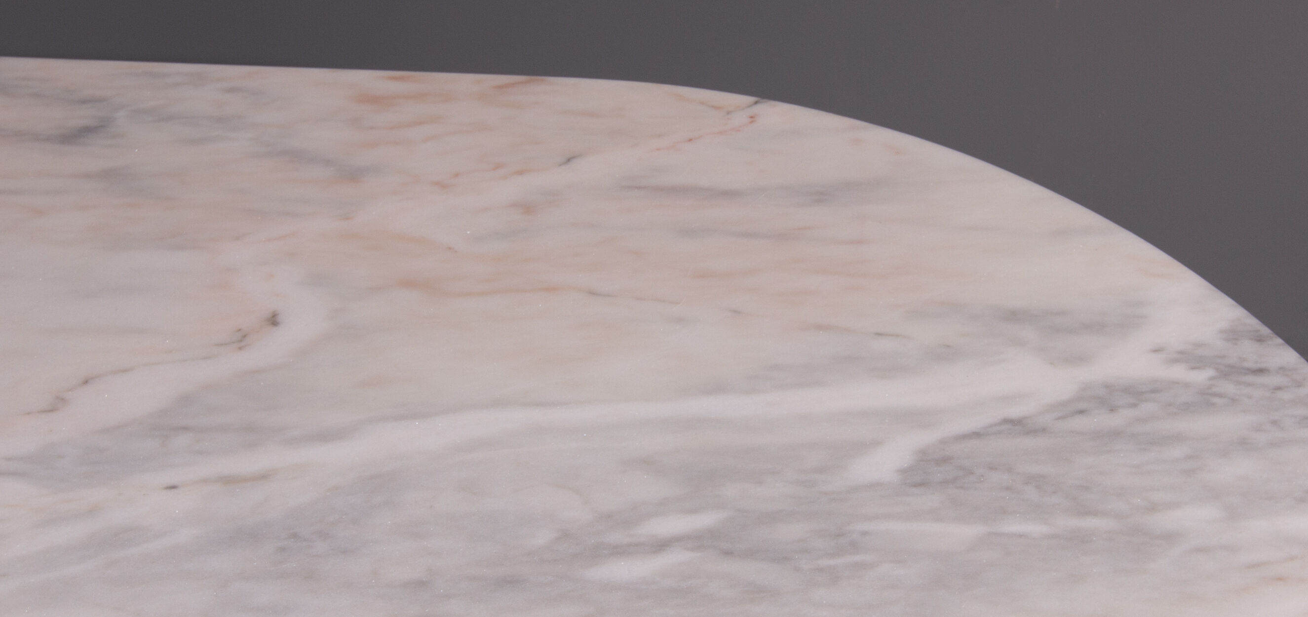 Dining table with oval Carrara marble top