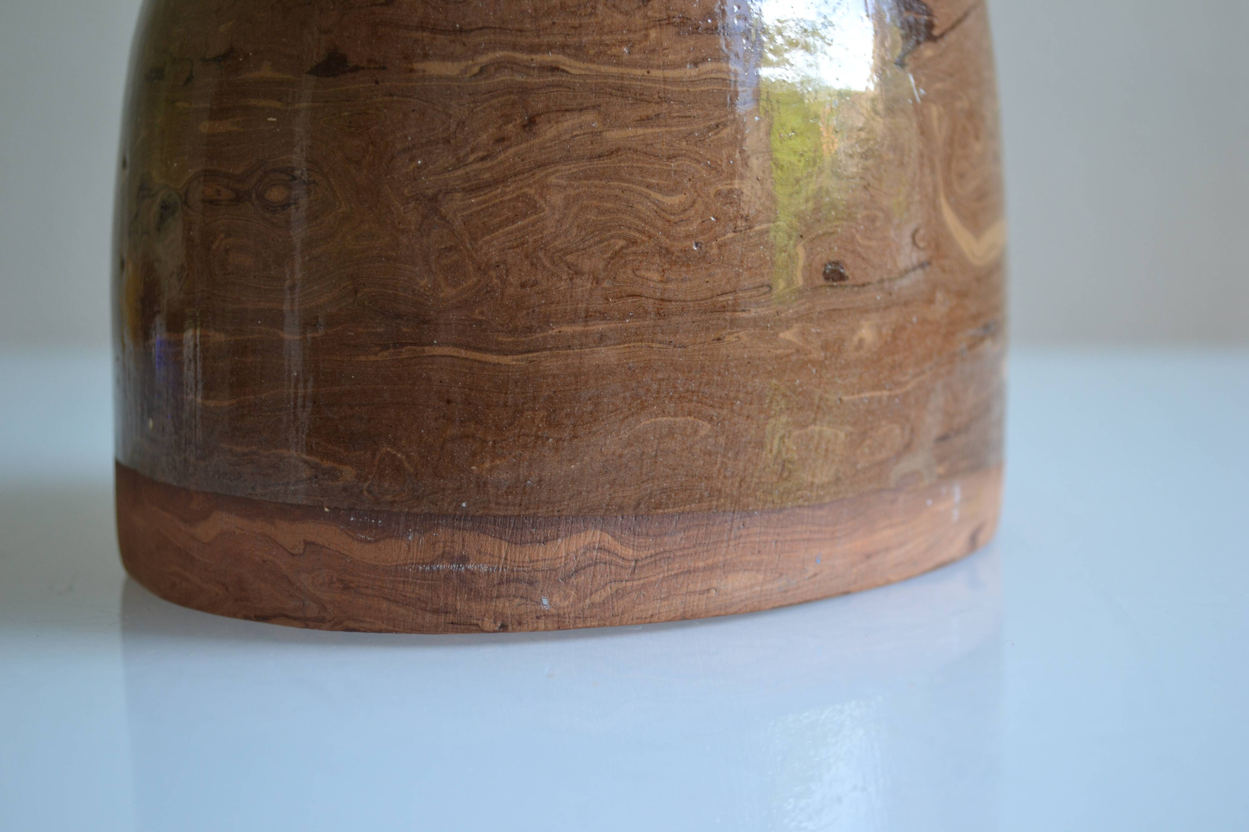 Bottle vase with an off-centre neck in ceramic, signature with a fish to be identified.